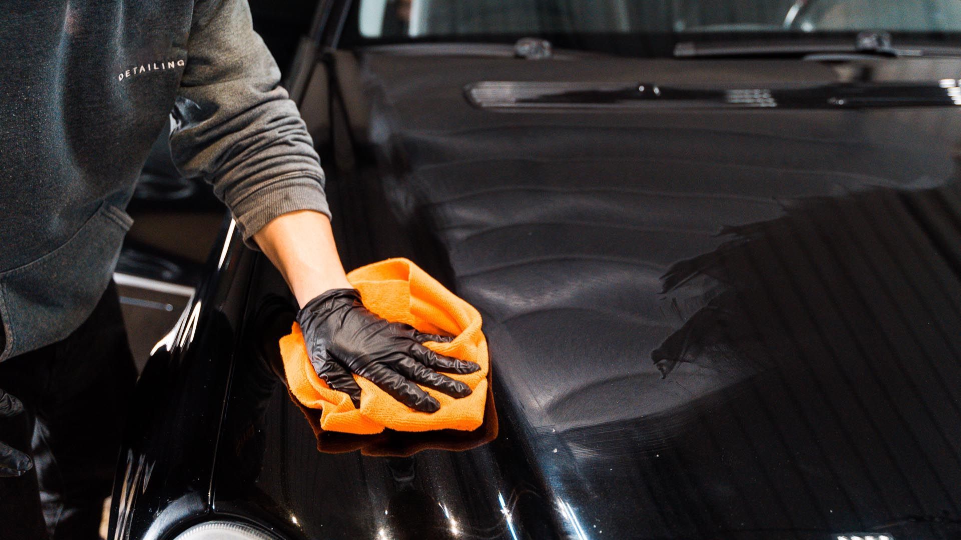 Wiping down black paint with a microfiber before ceramic coating